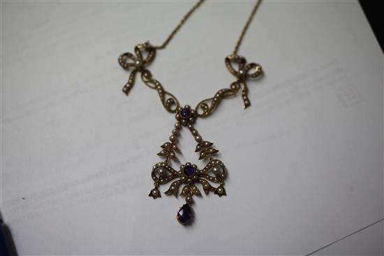 An Edwardian 9ct gold, amethyst and seed pearl drop necklace, 17.5in.